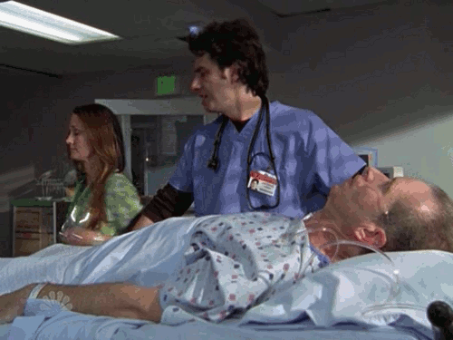 Scrubs-JD-pours-Kittens-on-Patient